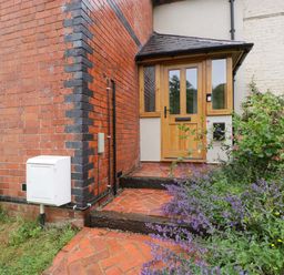 An entrance with a pathway and plants at 2 Loxter Villas Wellington Heath near Ledbury