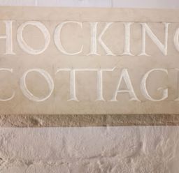 A plaque displaying the name Hocking Cottage