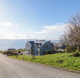 A house on a hill with a view of the sea at Ard Na Mara in Drung near Quigley's Point, County Donegal