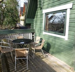 An outdoor area with a table and chairs at Tor View Finlakes Holiday Park near Chudleigh