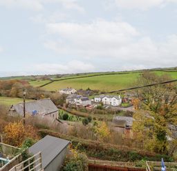 A rural view with houses and fields at Golygfa in Pandy Tudur near Llanrwst