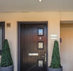 A door with house number 4 at Craster House in Seahouses