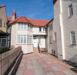 An outdoor area with a pathway and several buildings at Iveridge Sandsend