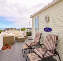 An outdoor terrace with seating at Park Lane in New Quay