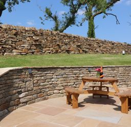A wooden table and benches in an outdoor area at Pendle in Nelson