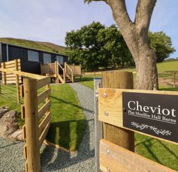 An exterior view of Cheviot property with pathway and fence in Oswestry