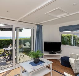 A living room with an outdoor view at Stella Maris in Torpoint