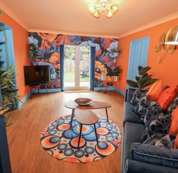 A living room with a sofa and coffee table at Annexe in East End near Brantham