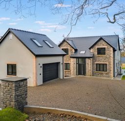 A house with garage and driveway at Ty Landsker in Milford Haven