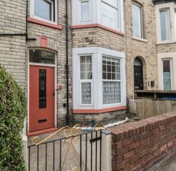 Front facade with a door and windows at 170 Victoria Road