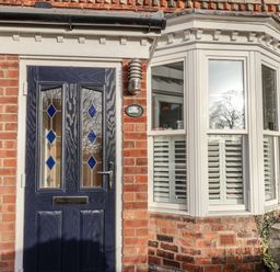 A front entrance with a door and window at 1 Castle Terrace