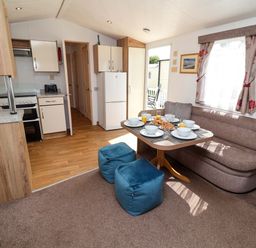 A kitchen with a dining area at 21 Poplar Avenue, Felixstowe, Suffolk