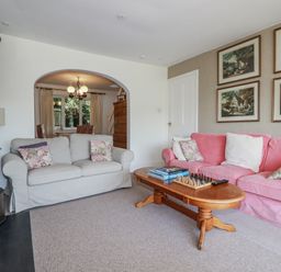 A living room with sofas and a coffee table at Kiln Cottage in Golant near Tywardreath