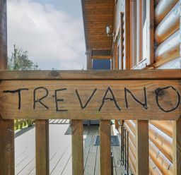 A wooden sign with the name Trevano at Trevano in St Breward