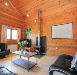 A living room with a sofa and coffee table at Eden in St Breward