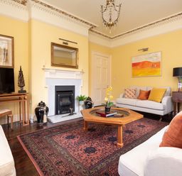 A living room with furniture and decor at The Old Vicarage St Issey