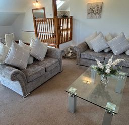 A living room with a sofa and coffee table at East Cottage East Knapton near Rillington