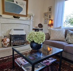 A living room with a sofa and a coffee table at Apple Byrd in Kendal
