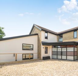 A house exterior with gravel driveway at Manor Farm House in Merton near Bicester