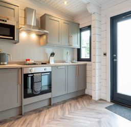 A kitchen with cabinets and appliances at Askrigg in Aysgarth