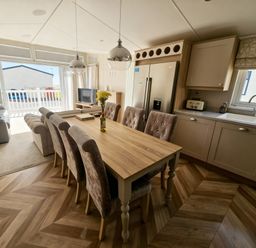 A dining room with a table and chairs at Ocean Edge Leisure Park - Holiday Accommodation 21286 Morecambe