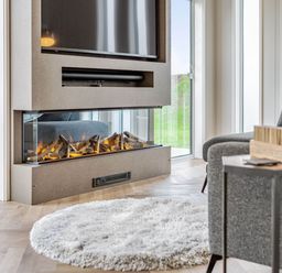 A living room with a fireplace and television at The Sheraton Retreat in Wigton