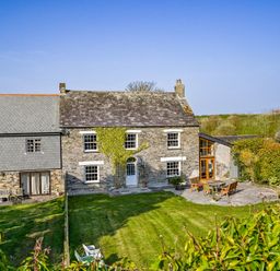 A house with garden and patio furniture at The Old Farm House near Pelynt