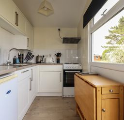 A kitchen with appliances and cabinets at Stanbury in St Merryn