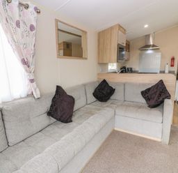 A living room with a sofa in Peaceful Stranraer