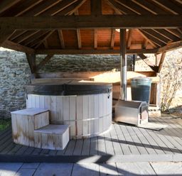 An outdoor area with a hot tub and steps at ASH HOUSE Wincanton