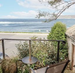 A view of the ocean from a balcony at Cove Retreat in Penzance