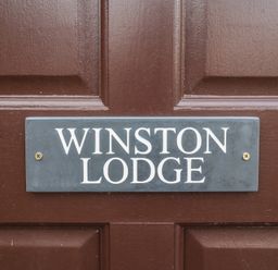 A door with a nameplate at Winston Lodge in Beccles