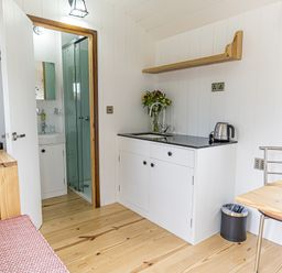 A kitchen with a sink and kettle at No 1 The Orchard Upton Warren