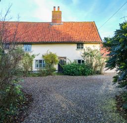 A house with a gravel driveway at Town Farm in 