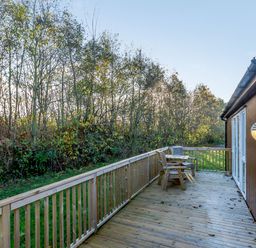 An outdoor area with decking and furniture at Cherry Tree in Carlton Miniott near Thirsk