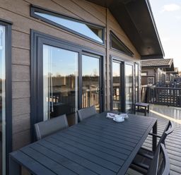 An outdoor area with a table and chairs at Keswick (Pet) Penrith