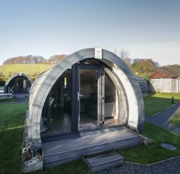 An outdoor pod structure at Pod 8 (No Pets) Tewitfield
