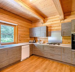 A kitchen with sink and appliances at Foresters Spa Plus in Dundee