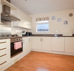 A kitchen with oven, stove, and sink at 65 Benasa Lodge in Winnard's Perch near St Columb Major