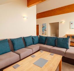A living room with a sofa and a coffee table at 65 Benasa Lodge in Winnard's Perch near St Columb Major