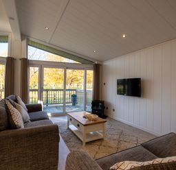 A living room with a sofa and coffee table at Wentworth in Waltham