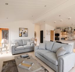 A living room featuring sofas and a coffee table at The Luxury Hideaway in Waltham