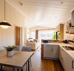 A kitchen with a table and chairs at Luxury Boutique Retreat Pet in Waltham