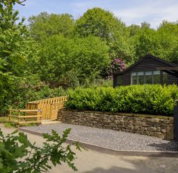 A house with garden and gate at Lodge at Nadur Commins Coch near Machynlleth