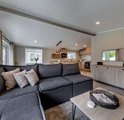 A living room with a sofa and coffee table at Saron 2.0 Pet Llandyrnog