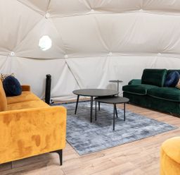 A snug with seating and a coffee table at The Dome (Pet) Great Ayton