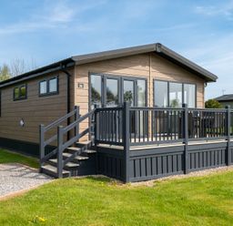 A house with a deck and steps at Greystone in Great Ayton