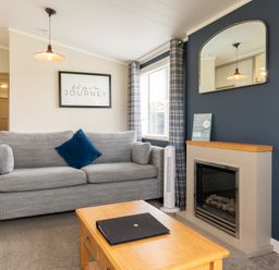 A living room with a sofa and a coffee table at Rosedale in Great Ayton
