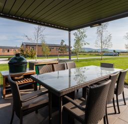 An outdoor dining area with table and chairs at Roseberry in Great Ayton