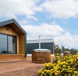 An outdoor area with buildings and hot tubs at The Grays in North Berwick